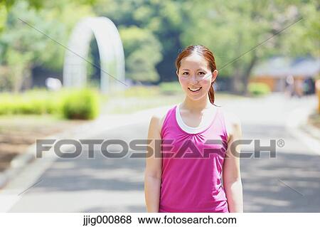 Young Japanese girl in fitness clothes in the park View Large Photo Image Stock Photo - Young Japanese girl in fitness clothes in the park. Fotosearch