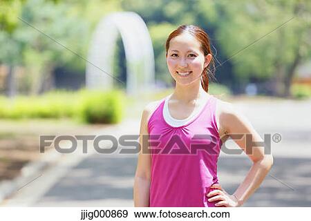 Young Japanese girl in fitness clothes in the park View Large Photo Image Stock Photo - Young Japanese girl in fitness clothes in the park. Fotosearch