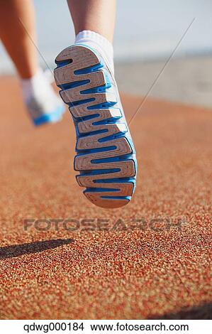 Young Japanese girl jogging View Large Photo Image Picture - Young Japanese girl jogging. Fotosearch
