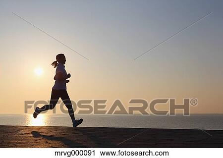 Young Japanese girl jogging View Large Photo Image Stock Image - Young Japanese girl jogging. Fotosearch