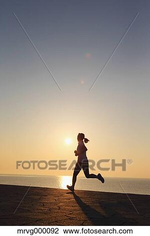 Young Japanese girl jogging View Large Photo Image Stock Image - Young Japanese girl jogging. Fotosearch