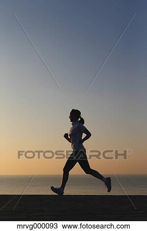 Young Japanese girl jogging View Large Photo Image Stock Image - Young Japanese girl jogging. Fotosearch