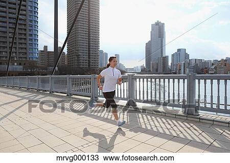Young Japanese girl jogging View Large Photo Image Stock Image - Young Japanese girl jogging. Fotosearch