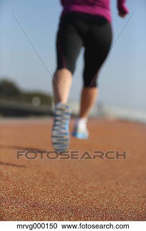 Young Japanese girl jogging View Large Photo Image Stock Image - Young Japanese girl jogging. Fotosearch