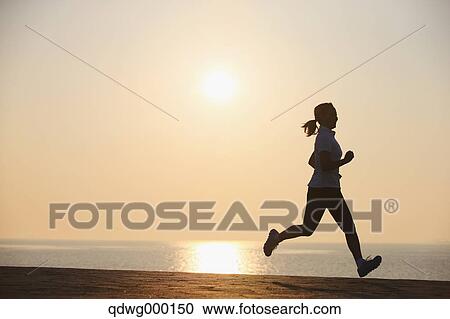Stock Image - Young Japanese girl jogging. Fotosearch