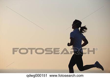 Stock Image - Young Japanese girl jogging. Fotosearch