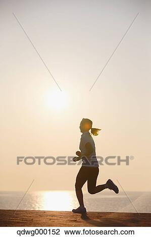 Young Japanese girl jogging View Large Photo Image Stock Image - Young Japanese girl jogging. Fotosearch