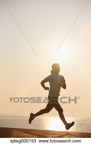 Young Japanese girl jogging View Large Photo Image Stock Image - Young Japanese girl jogging. Fotosearch