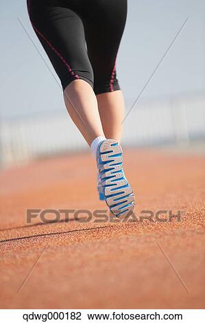 Young Japanese girl jogging View Large Photo Image Stock Image - Young Japanese girl jogging. Fotosearch