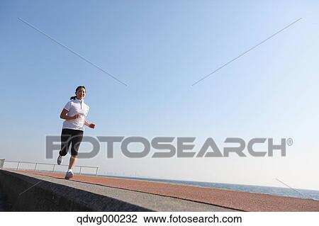 Young Japanese girl jogging View Large Photo Image Stock Image - Young Japanese girl jogging. Fotosearch