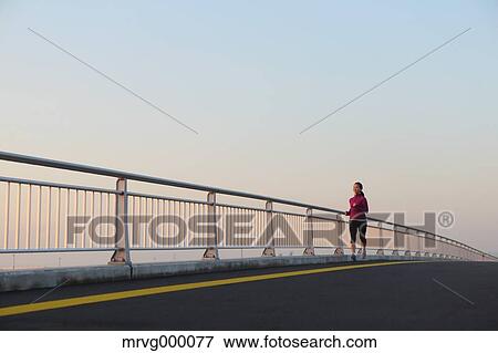 Young Japanese girl jogging View Large Photo Image Stock Photo - Young Japanese girl jogging. Fotosearch