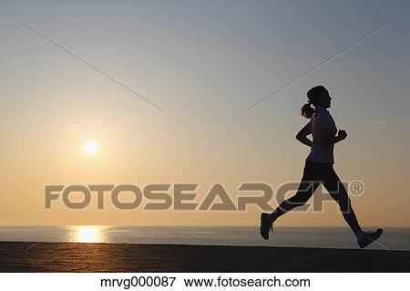 Stock Photo - Young Japanese girl jogging. Fotosearch