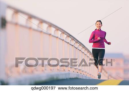 Stock Photo - Young Japanese girl jogging. Fotosearch