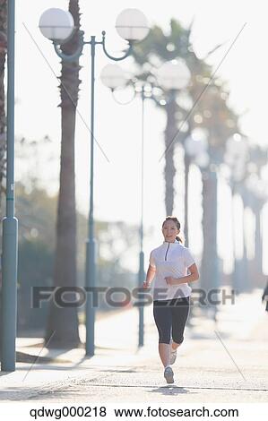 Young Japanese girl jogging View Large Photo Image Stock Photo - Young Japanese girl jogging. Fotosearch