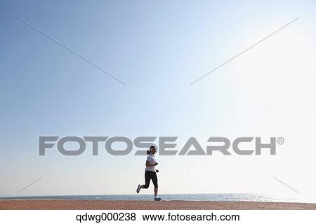 Young Japanese girl jogging View Large Photo Image Stock Photo - Young Japanese girl jogging. Fotosearch