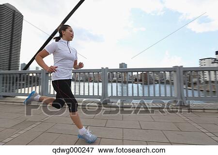Young Japanese girl jogging View Large Photo Image Stock Photo - Young Japanese girl jogging. Fotosearch