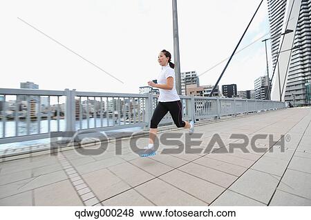 Young Japanese girl jogging View Large Photo Image Stock Photo - Young Japanese girl jogging. Fotosearch