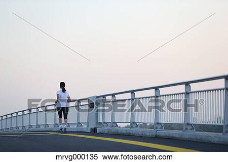 Young Japanese girl jogging View Large Photo Image Stock Photography - Young Japanese girl jogging. Fotosearch