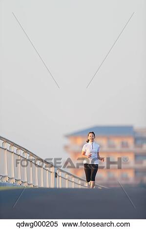 Young Japanese girl jogging View Large Photo Image Stock Photography - Young Japanese girl jogging. Fotosearch