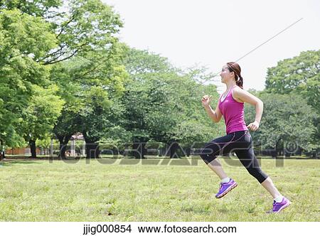 Young Japanese girl running in the park View Large Photo Image Picture - Young Japanese girl running in the park. Fotosearch