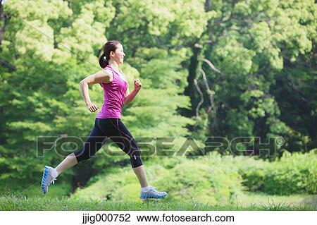 Young Japanese girl running in the park View Large Photo Image Stock Image - Young Japanese girl running in the park. Fotosearch