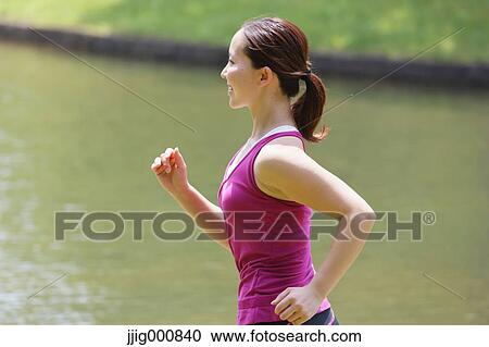 Young Japanese girl running in the park View Large Photo Image Stock Image - Young Japanese girl running in the park. Fotosearch