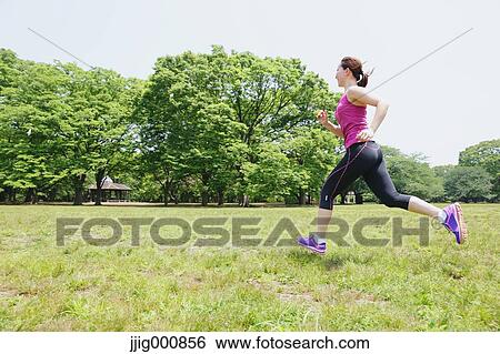 Young Japanese girl running in the park View Large Photo Image Stock Photograph - Young Japanese girl running in the park. Fotosearch