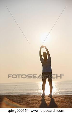 Young Japanese girl stretching View Large Photo Image Picture - Young Japanese girl stretching. Fotosearch