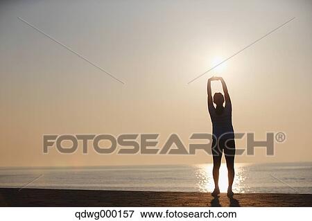 Stock Photo - Young Japanese girl stretching. Fotosearch