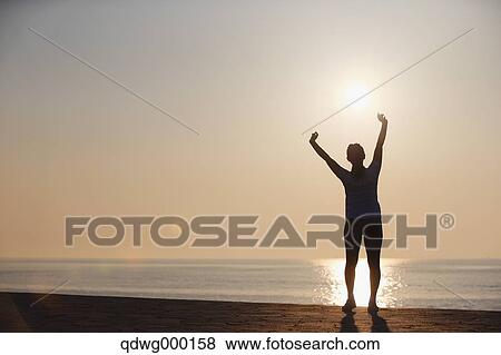 Stock Photo - Young Japanese girl stretching. Fotosearch