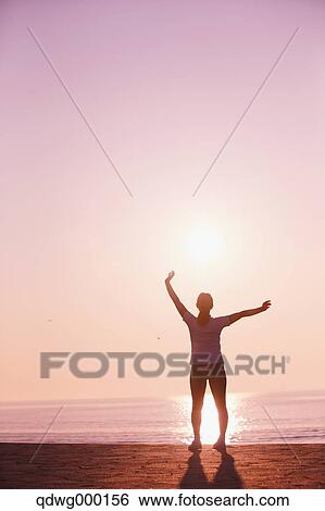 Stock Photograph - Young Japanese girl stretching. Fotosearch