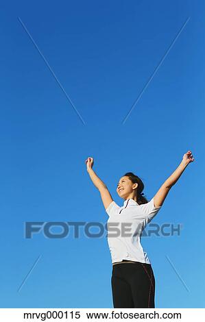 Young Japanese girl stretching View Large Photo Image Stock Photography - Young Japanese girl stretching. Fotosearch