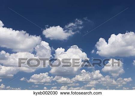 Blue sky with clouds View Large Photo Image Stock Image - Blue sky with clouds. Fotosearch