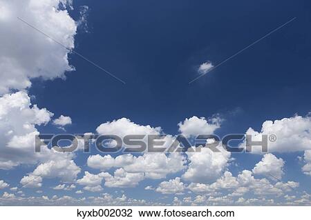 Stock Image - Blue sky with clouds. Fotosearch