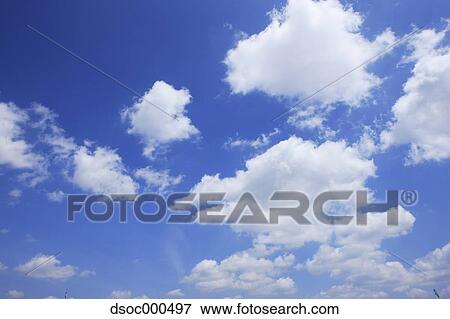 Blue sky with clouds View Large Photo Image Stock Photo - Blue sky with clouds. Fotosearch