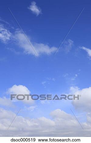 Blue sky with clouds View Large Photo Image Stock Photo - Blue sky with clouds. Fotosearch