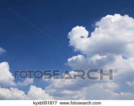 Blue sky with clouds View Large Photo Image Stock Photo - Blue sky with clouds. Fotosearch