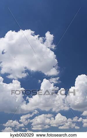 Stock Photo - Blue sky with clouds. Fotosearch