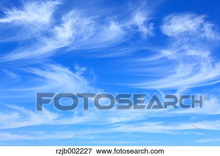 Stock Photo - Blue sky with clouds. Fotosearch