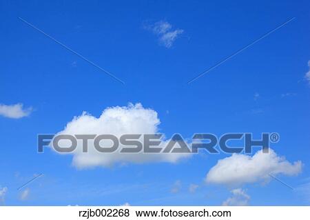 Blue sky with clouds View Large Photo Image Stock Photo - Blue sky with clouds. Fotosearch