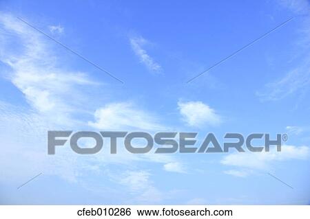 Blue sky with clouds View Large Photo Image Stock Photograph - Blue sky with clouds. Fotosearch