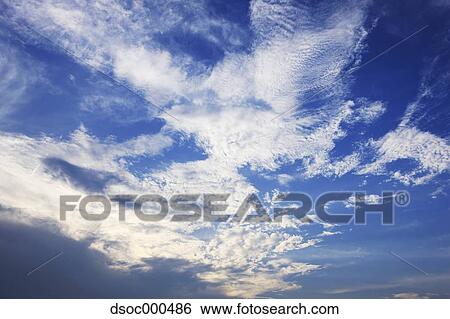 Blue sky with clouds View Large Photo Image Stock Photograph - Blue sky with clouds. Fotosearch