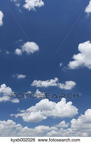 Stock Photograph - Blue sky with clouds. Fotosearch