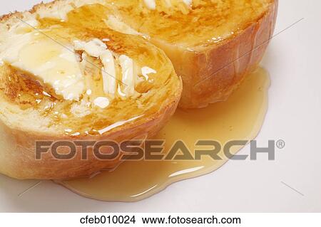 Butter on bread View Large Photo Image Picture - Butter on bread. Fotosearch