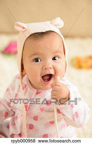 Newborn in the house View Large Photo Image Stock Photo - Newborn in the house. Fotosearch