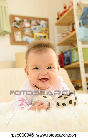 Newborn in the house View Large Photo Image Stock Photograph - Newborn in the house. Fotosearch