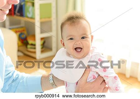 Newborn with his dad in the house View Large Photo Image Picture - Newborn with his dad in the house. Fotosearch