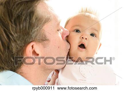Newborn with his dad in the house View Large Photo Image Stock Image - Newborn with his dad in the house. Fotosearch