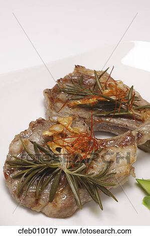 Roasted lamb View Large Photo Image Stock Photo - Roasted lamb. Fotosearch