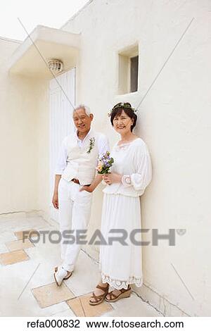 Senior adult Japanese couple celebrating View Large Photo Image Stock Image - Senior adult Japanese couple celebrating. Fotosearch